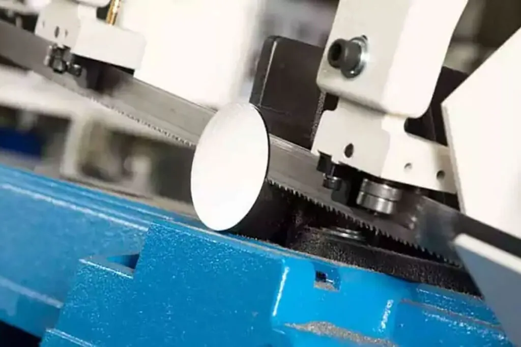 Photograph showing band saw with carbide blade inserts