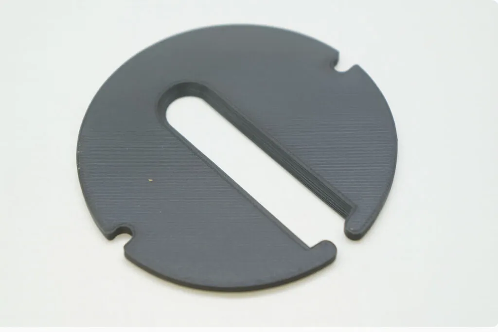 Photo of a band saw zero clearance blade insert